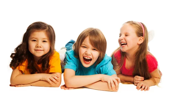 Kids laying in line — Stock Photo, Image