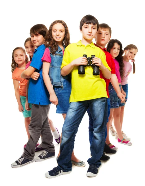 Group of and confident boy with binoculars — Stock Photo, Image