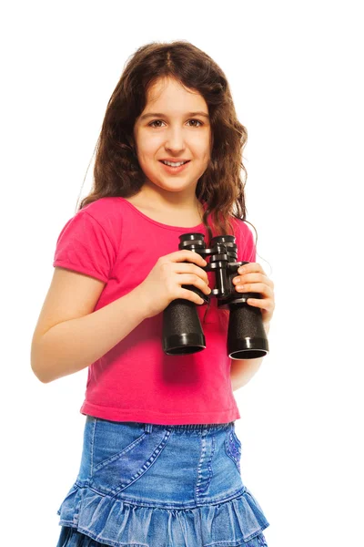 Nice girl holding binoculars — Stock Photo, Image