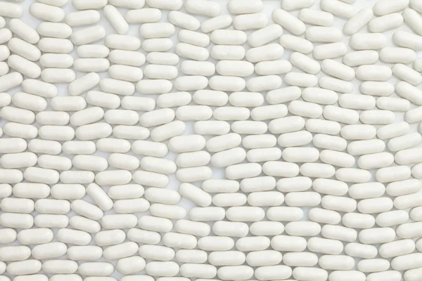 Wiersze białe tabletki — Zdjęcie stockowe