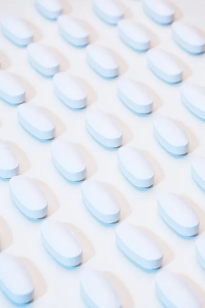 Pills on factory table — Stock Photo, Image