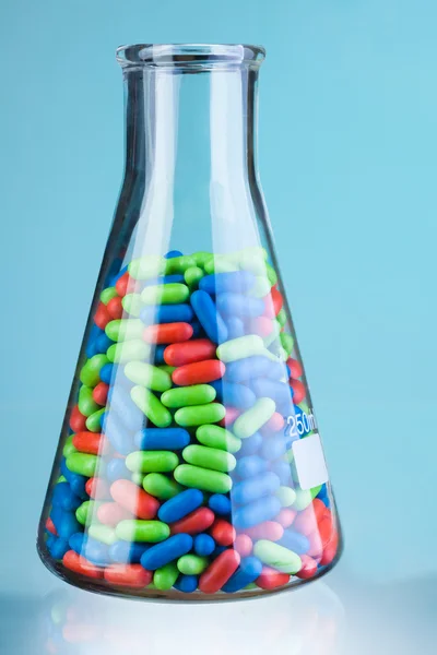 Flask full of drugs and pills — Stock Photo, Image