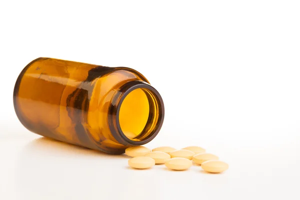 Empty jar with drug tablets — Stock Photo, Image