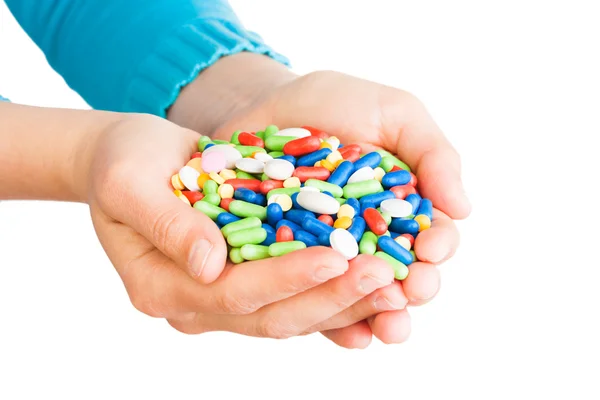 Mão cheia de comprimidos — Fotografia de Stock