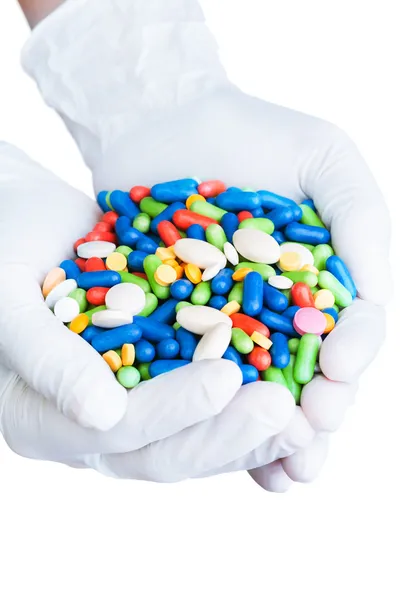 Handschuhe mit vielen Medikamenten — Stockfoto