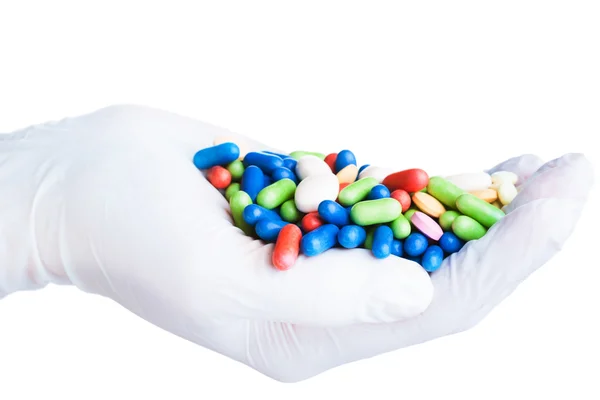 Glove with many pills — Stock Photo, Image