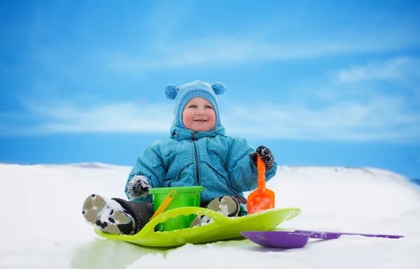 Boy on sled — Stock Photo, Image