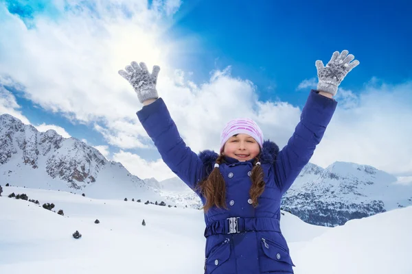 Excited girl with lifted hands — Stock Photo, Image