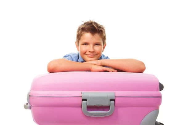 Junge und Reisekoffer — Stockfoto