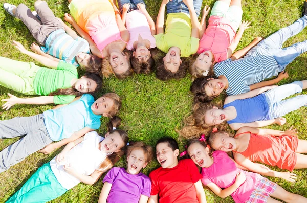 Many group on the grass — Stock Photo, Image