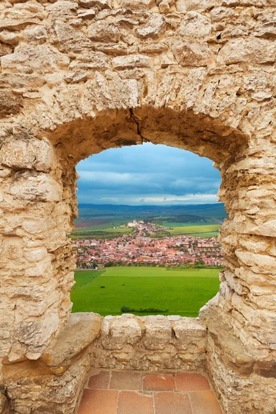Loophole in castle and Spis hrad — Stock Photo, Image