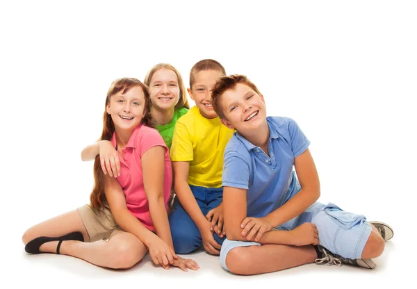 Group of kids sitting isolated — Stock Photo, Image