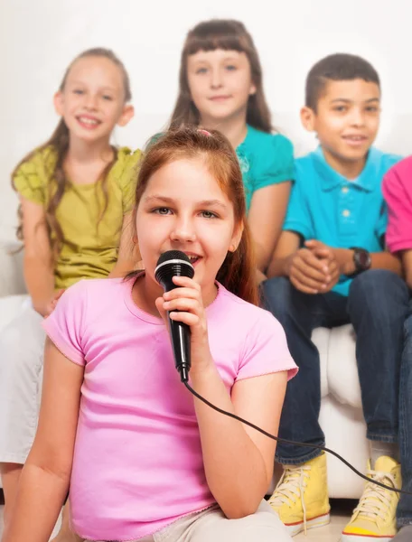Close portrait of girl singing Royalty Free Stock Photos
