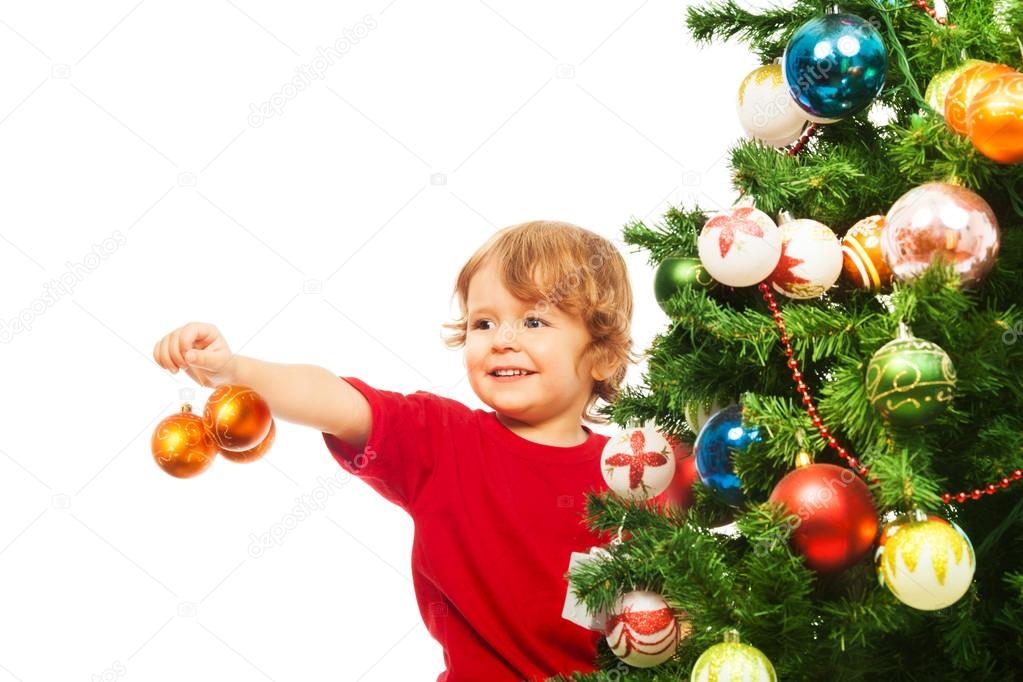 Decorating Christmas tree with balls