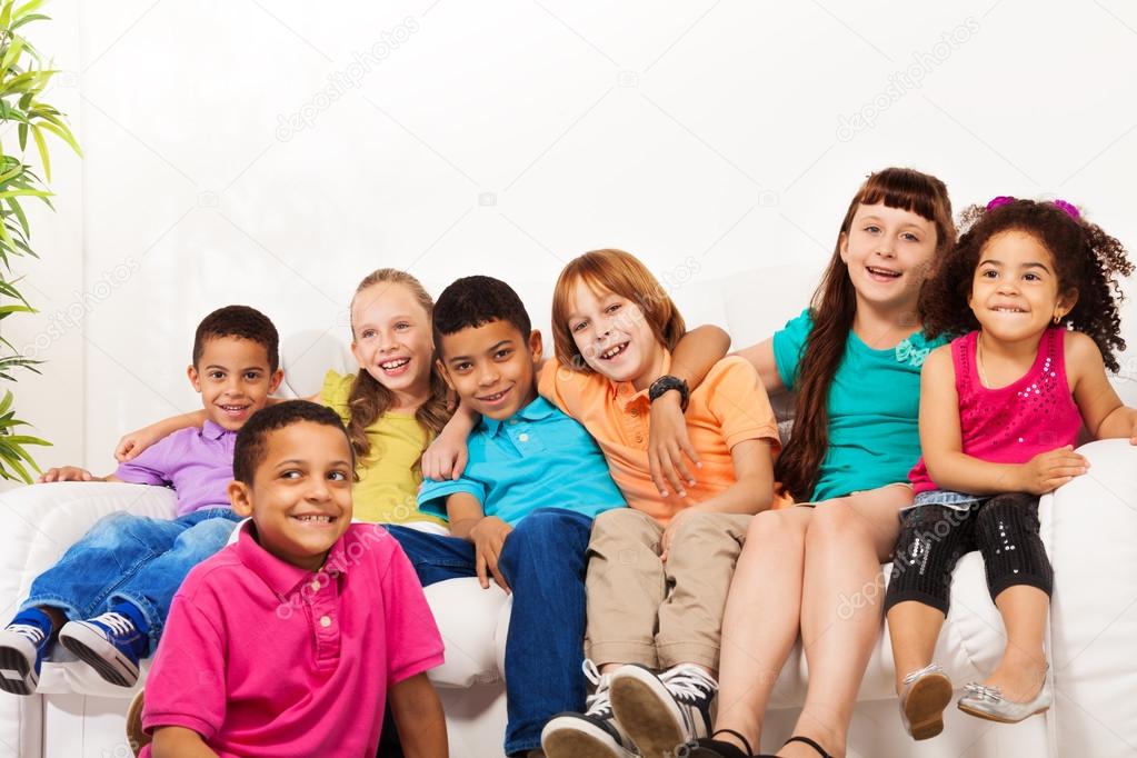 Large group of cute kids at home