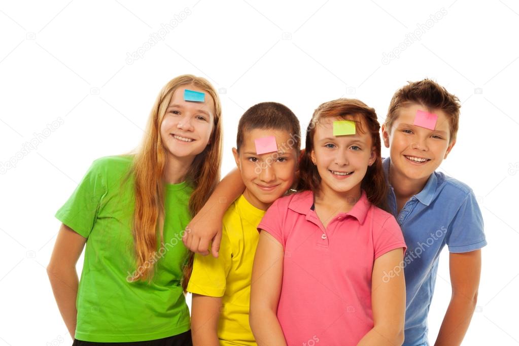 Boys and girls with stickers on forehead