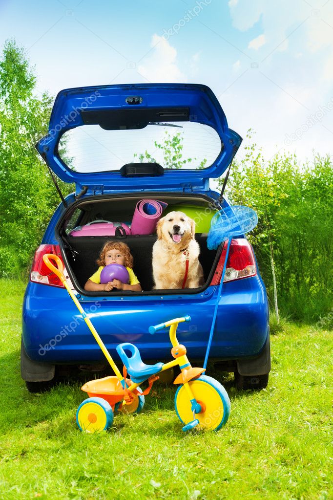 Boy and dog waiting for departure