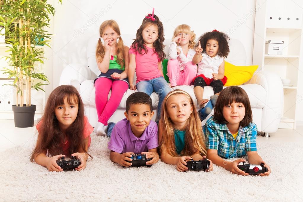 Group of little kids playing video game