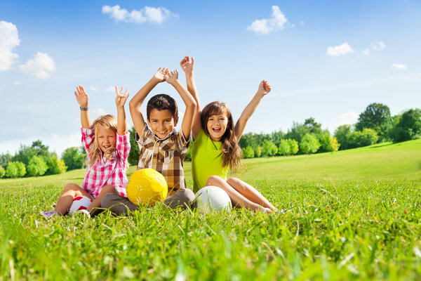 Happy kids with balls