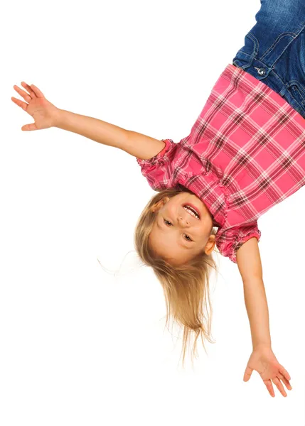 Girl hanging upside down — Stock Photo, Image