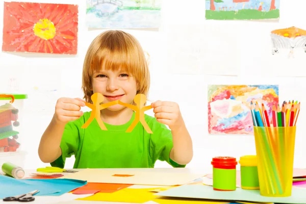 Boy with paper garland — Stock Photo, Image