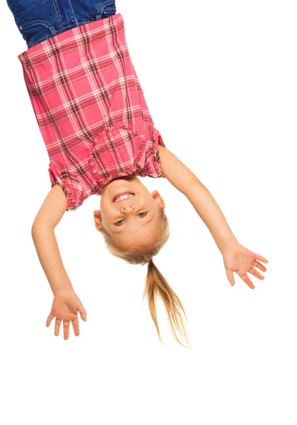 Girl hanging upside down — Stock Photo, Image