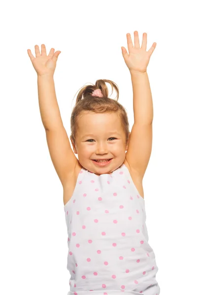 Little girl with lifted hands Stock Photo