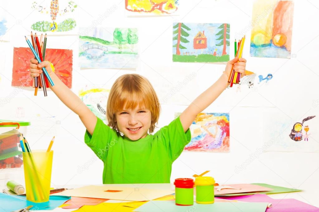 Boy with color pencils