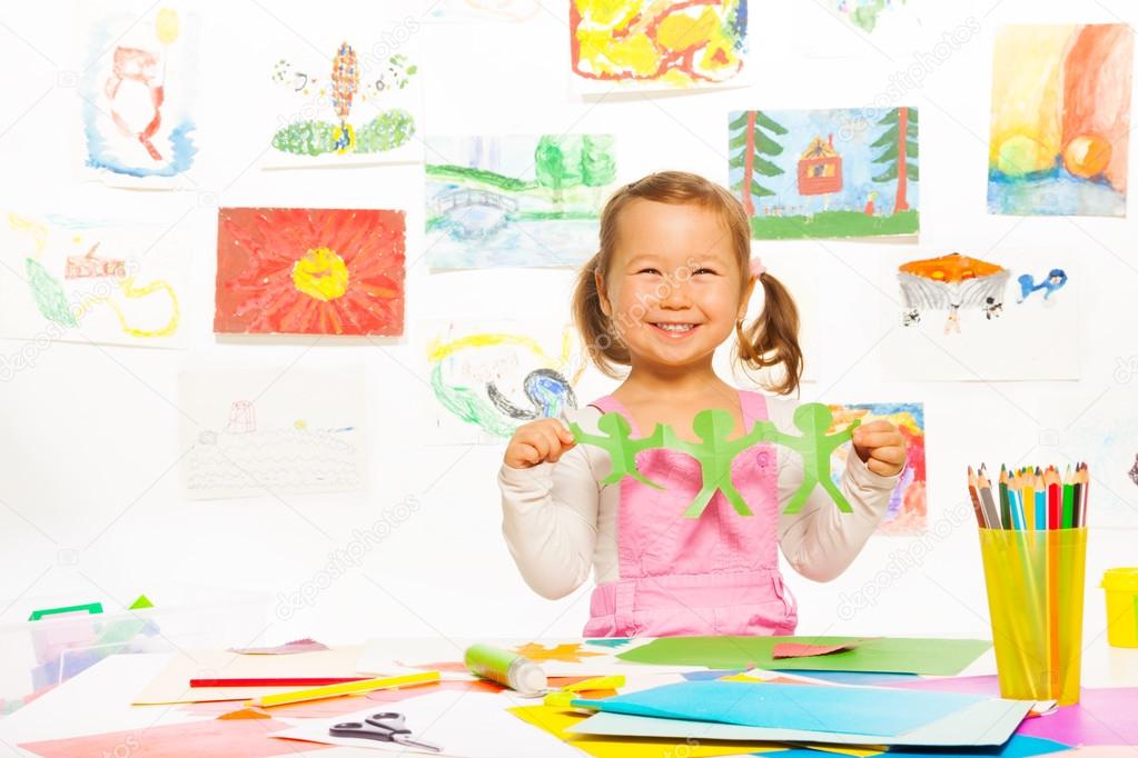 Beautiful girl with color paper