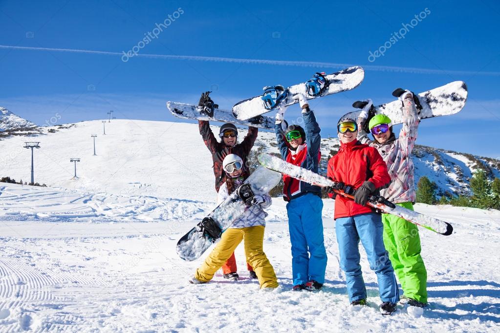 Friends standing on the mountain background