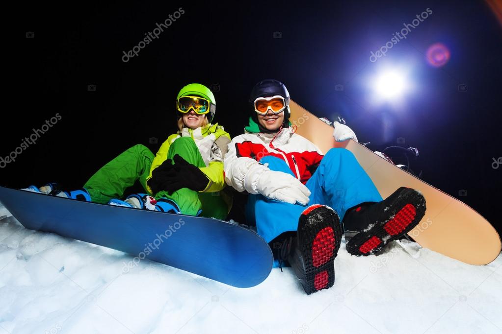 Man and woman relaxing after training
