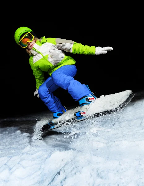 Girl jumping on snowboard — Stock Photo, Image