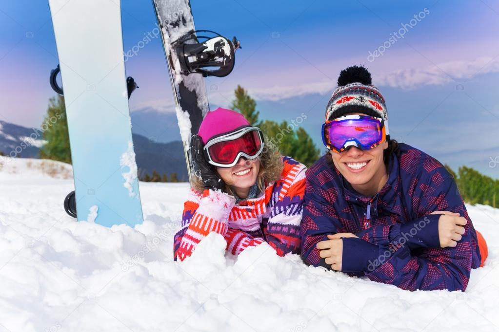 Two snowboarders