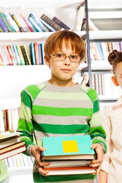 Boy in library — Stock Photo, Image