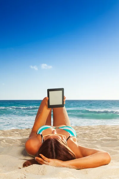 Reading on beach — Stock Image Reading on beach Stock Picture