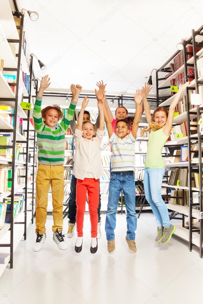 kids jump   in  library
