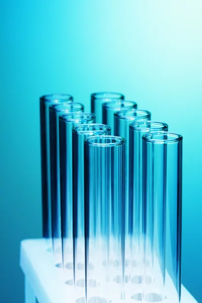 Rows of empty test tubes fixed together — Stock Photo, Image