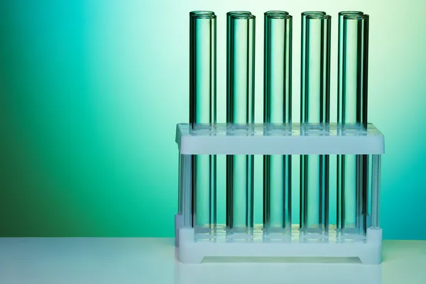 Empty test tubes organized and fixed in rows — Stock Photo, Image