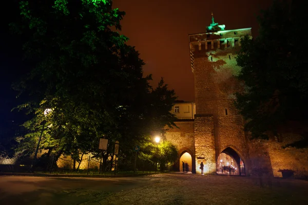 St. Florian's Street gates at night in Krakow — Stock Photo, Image