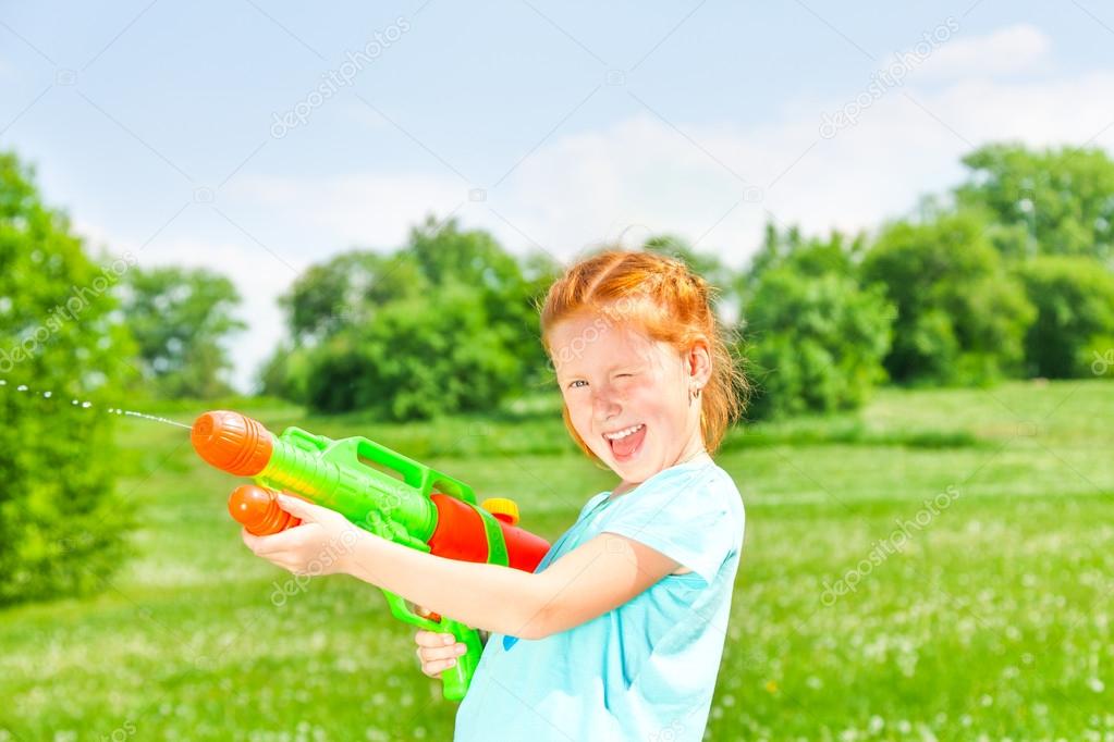 Girl with a water gun