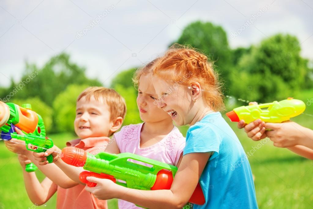 Kids with water guns