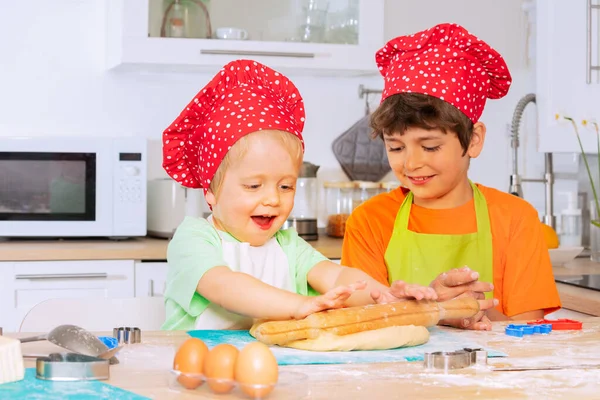 Two Boys Cook Wearing Chef Hat Rolling Dough Plunger Kitchen — Stock Photo, Image