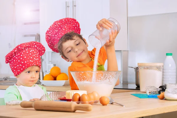 Little Boy Pour Out Sugar Mixing Bowl Preparing Dough Cooking — Stock Photo, Image