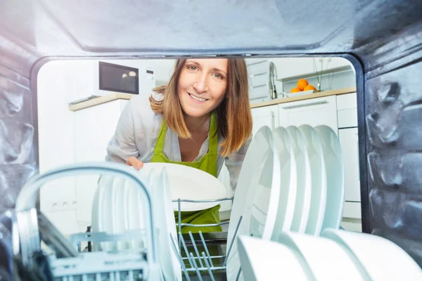 Smiling Woman Take Plates Dishes Out Dishwashing Machine View — Stock Photo, Image