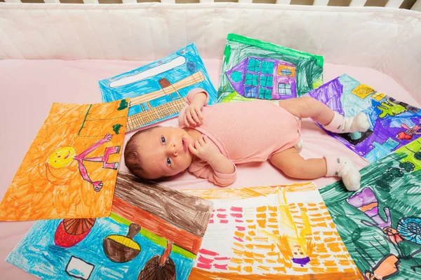 View Little Baby Girl Pink Laying Many Drawings Siblings — 스톡 사진