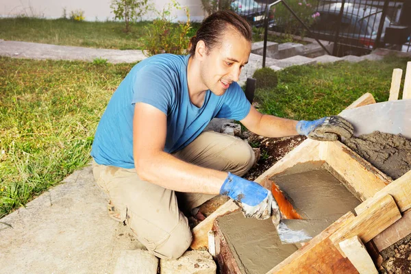 Man Making Small Concrete Staircase Garden Working Trowel — Stock Photo, Image