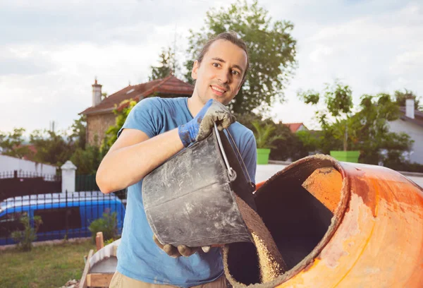 Man Add Bucket Sand Cement Mixer Doing Diy Work Home — Stock Photo, Image