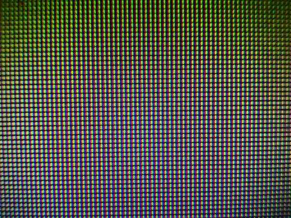 Extreme close-up of the pixels on the LCD screen with clearly visible different red green blue blocks