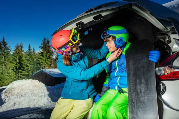 Mother Help Little Boy Dress Put Ski Helmet Sitting Trunk — Stock Fotó