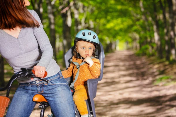 Close Portrait Little Girl Sitting Bicycle Seat Riding Mother Park — Φωτογραφία Αρχείου